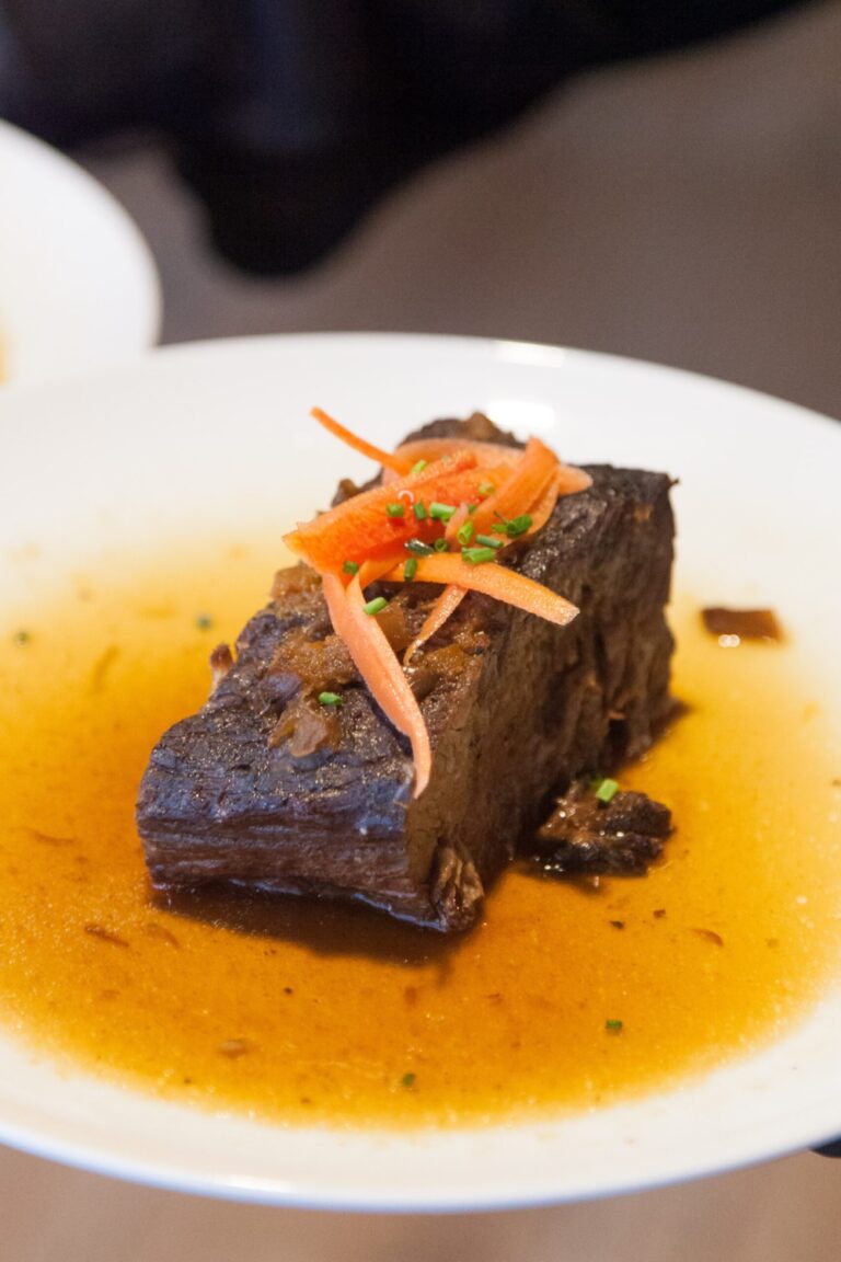Short rib with braised carrot, carrot ancho demi and escabeche