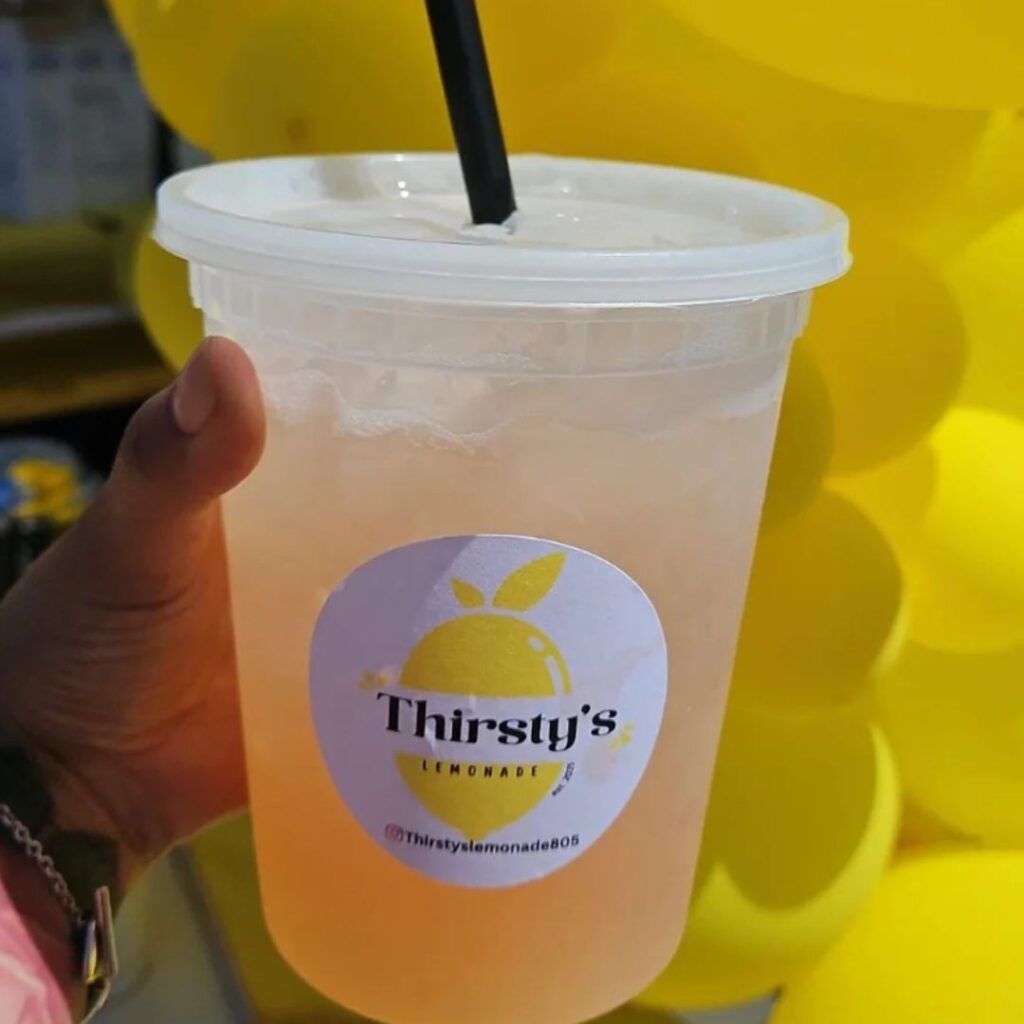 Photo of lemonade drink in a plastic cup