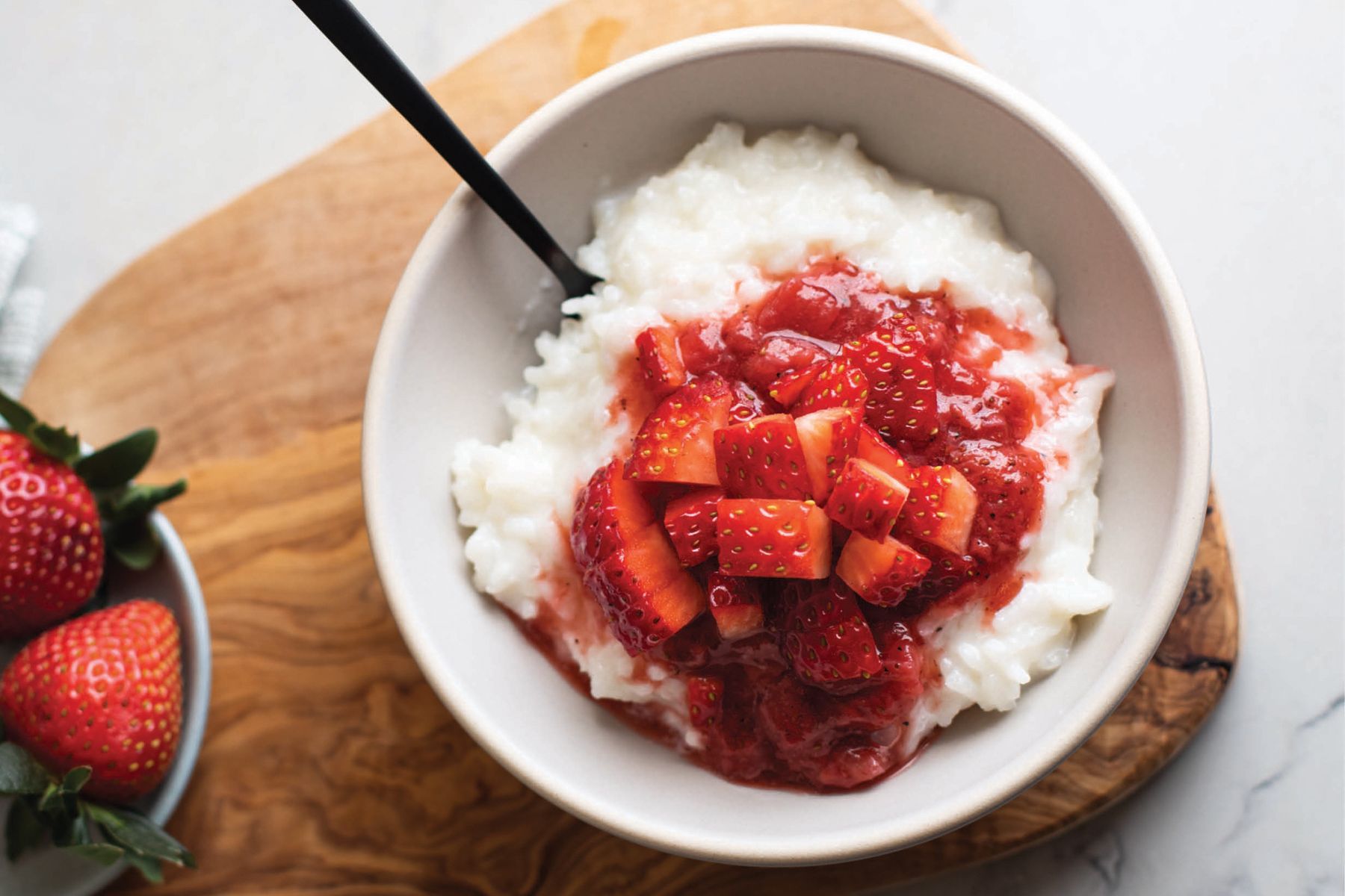 Photo of strawberries in a bowl with rice