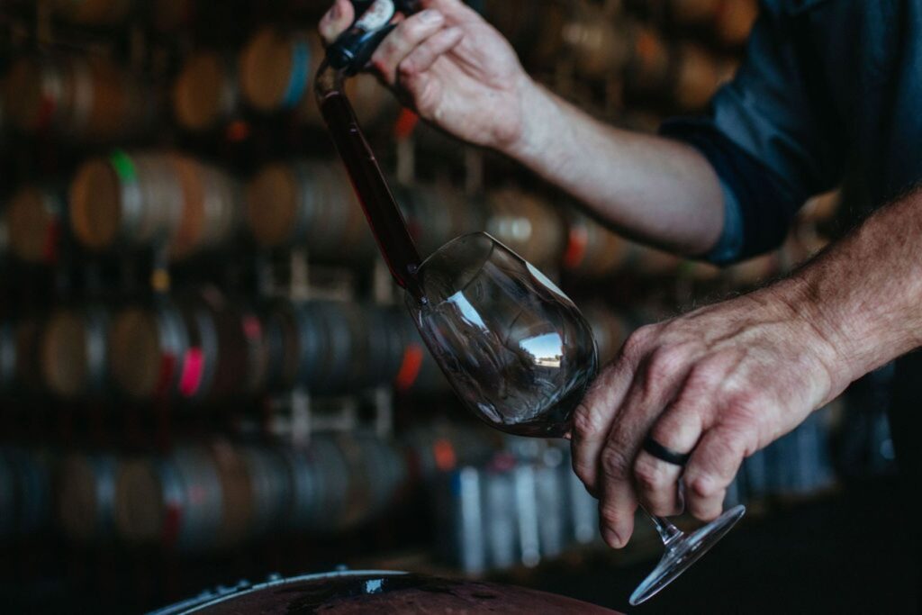 Photo of wine being poured from barrel