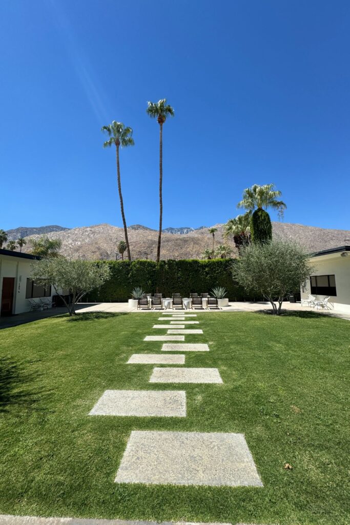 An open courtyard with a fire to gather around at night.