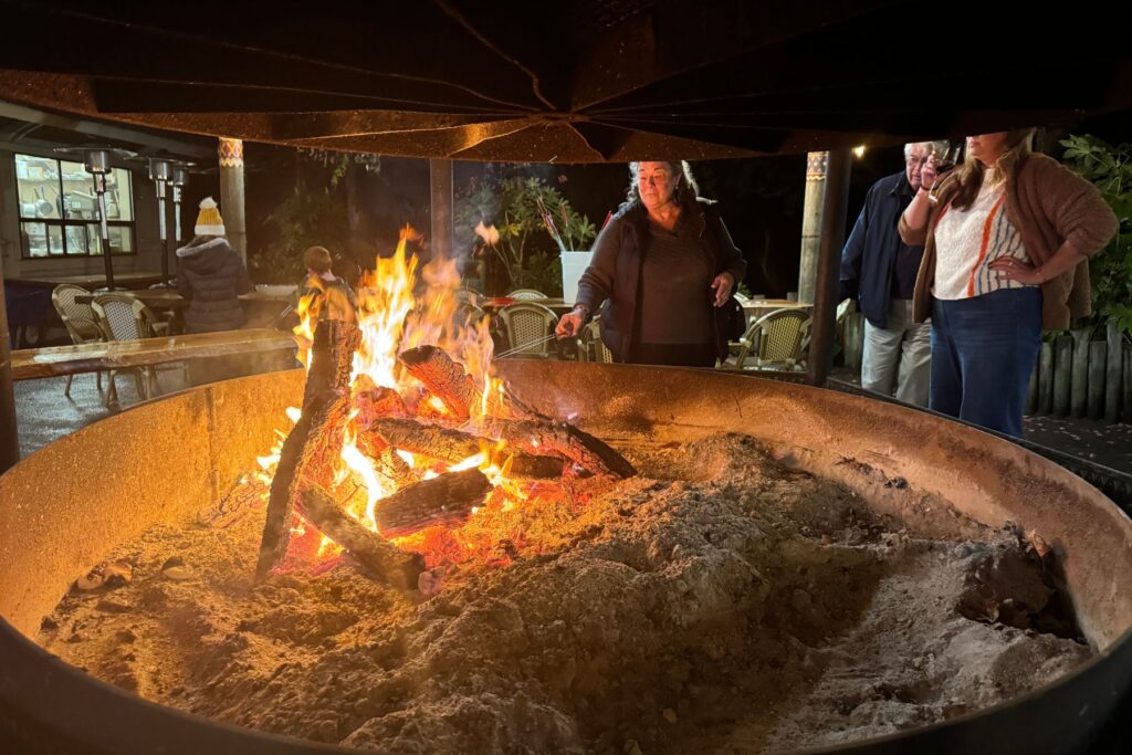 Photo of people using a firepit