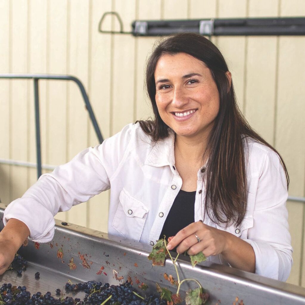 Woman with grape harvest