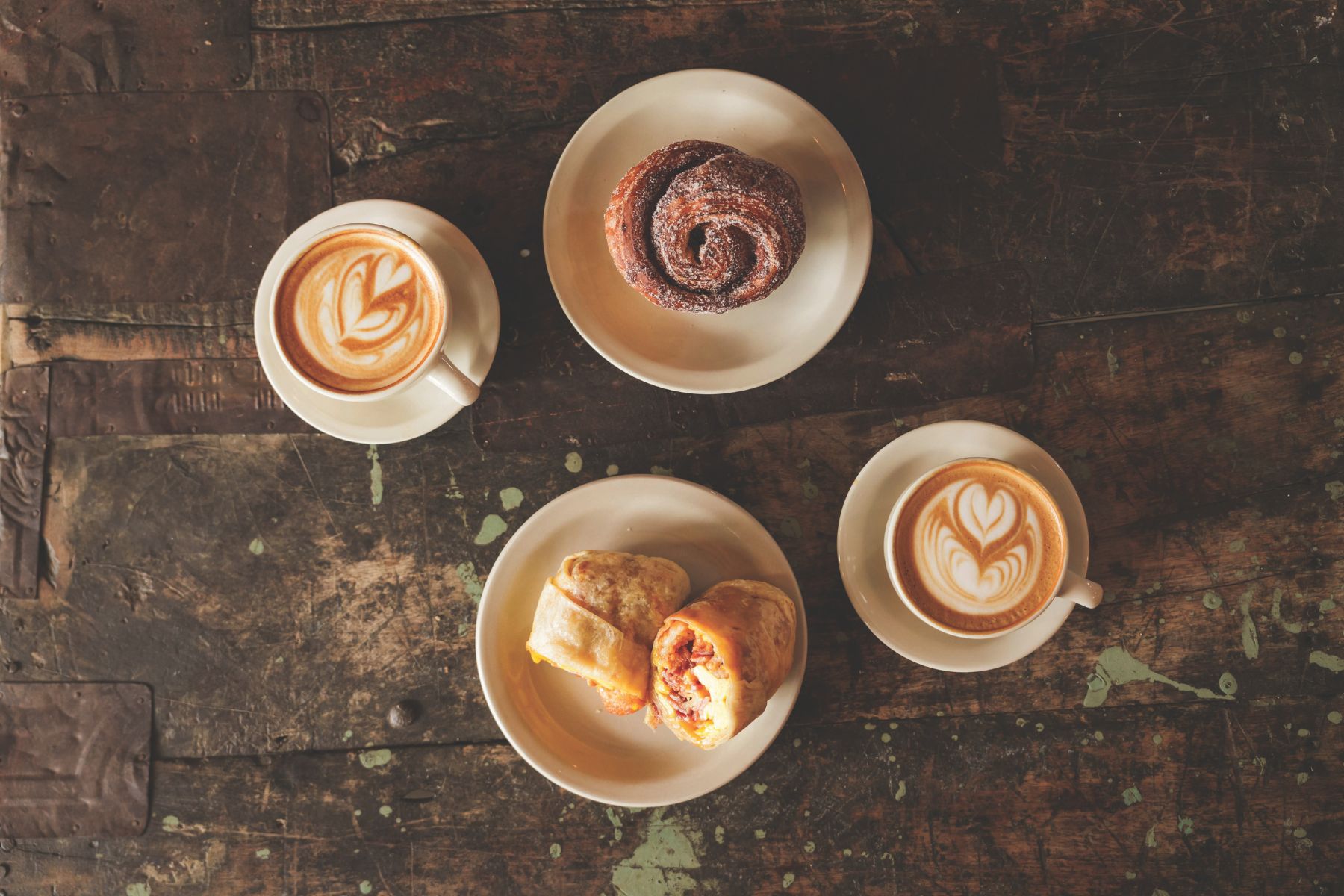 A spread of morning coffee and bites at KBRG Coffee Lab in Duncan Alley.