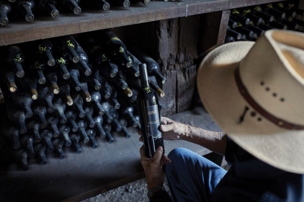 Unearthing a gem from Saucelito Canyon’s historic wine cellar. Photos courtesy of Saucelito Canyon Vineyard.